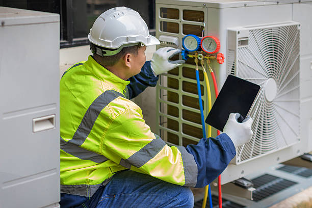 Professional Emergency Ac Repair technician working in Highland, CA
